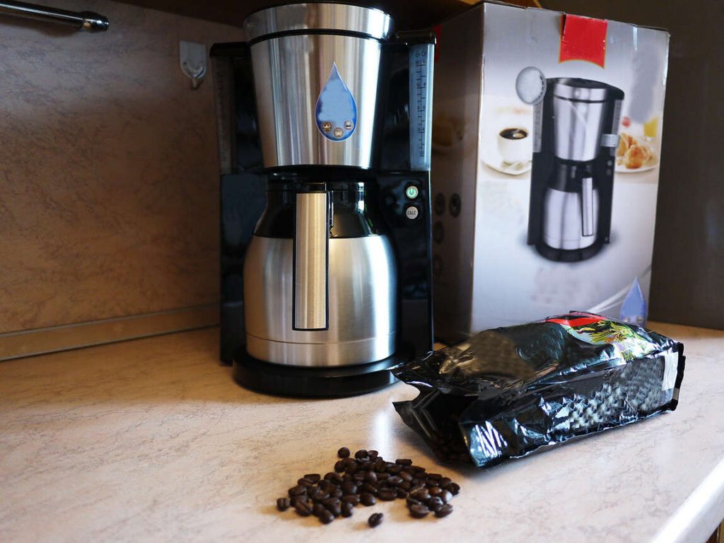 Drip Coffee Machine with bag of coffee beans