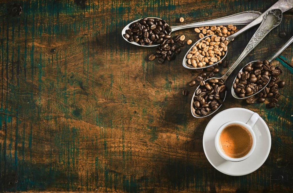 Espresso coffee with assorted roasted coffee beans